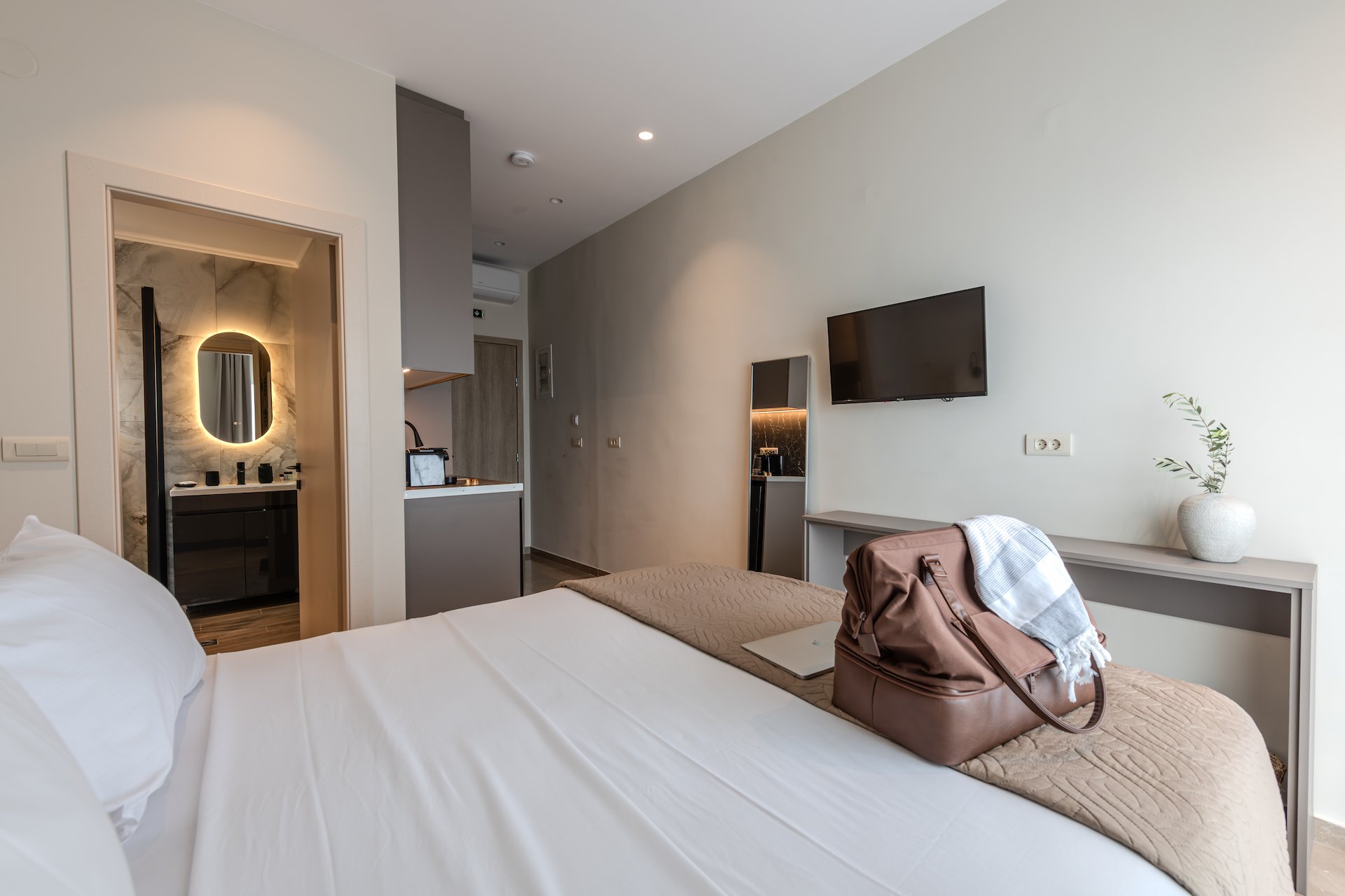 Deluxe Suite with sea view - balcony and view at Noma Suites Tolo