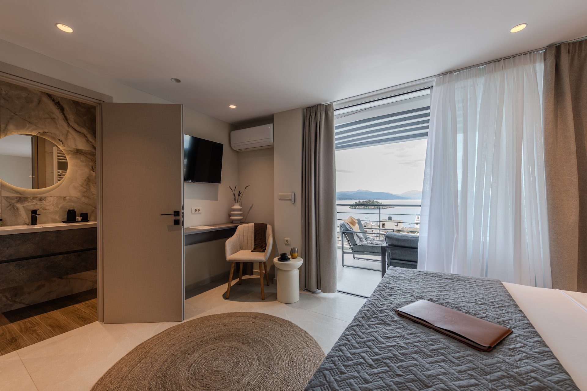 Penthouse Suite with Panoramic View - Spacious balcony and panoramic sea views at Noma Suites Tolo