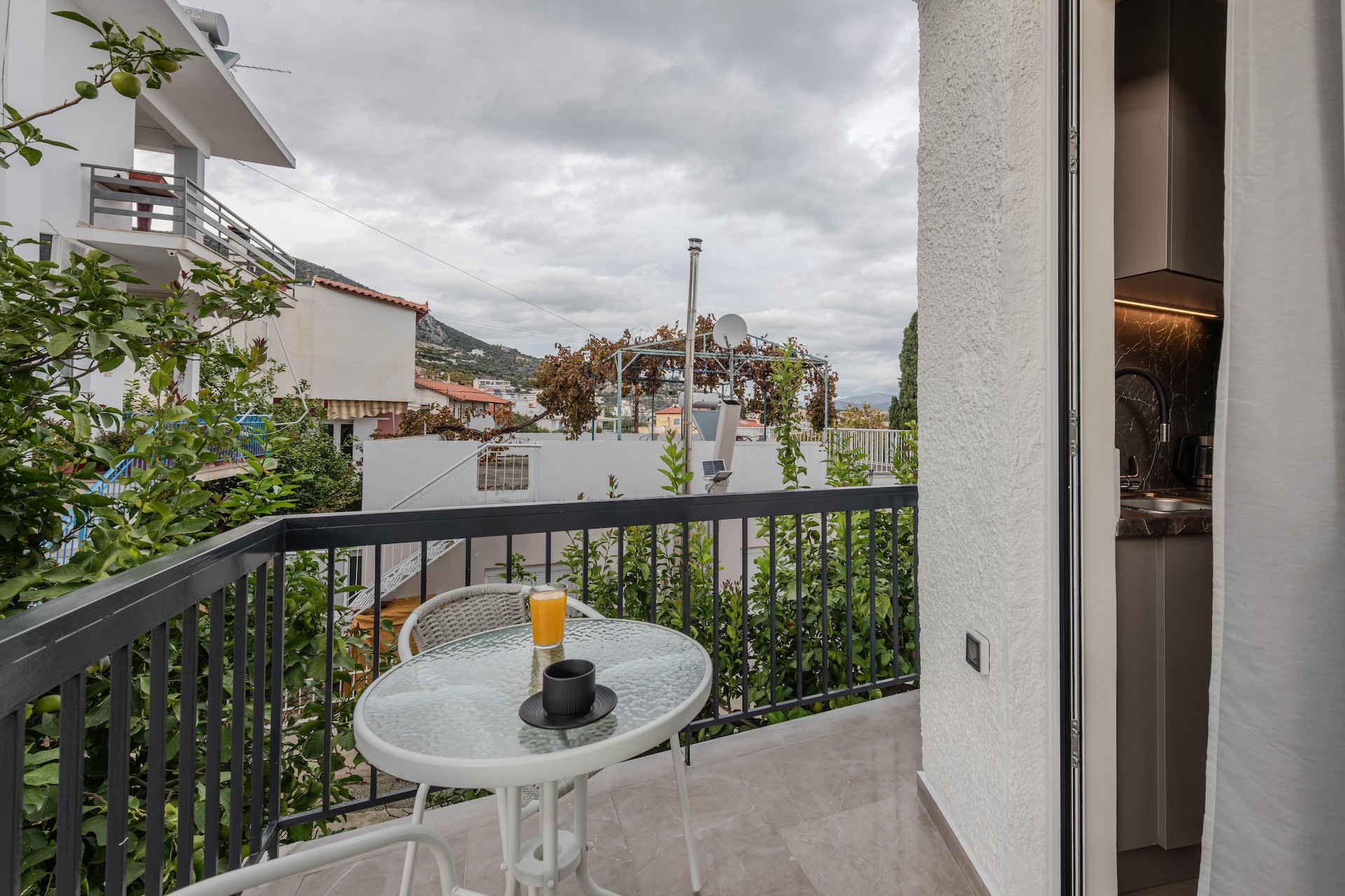 Superior Double Room with Garden View - balcony at Noma Suites Tolo