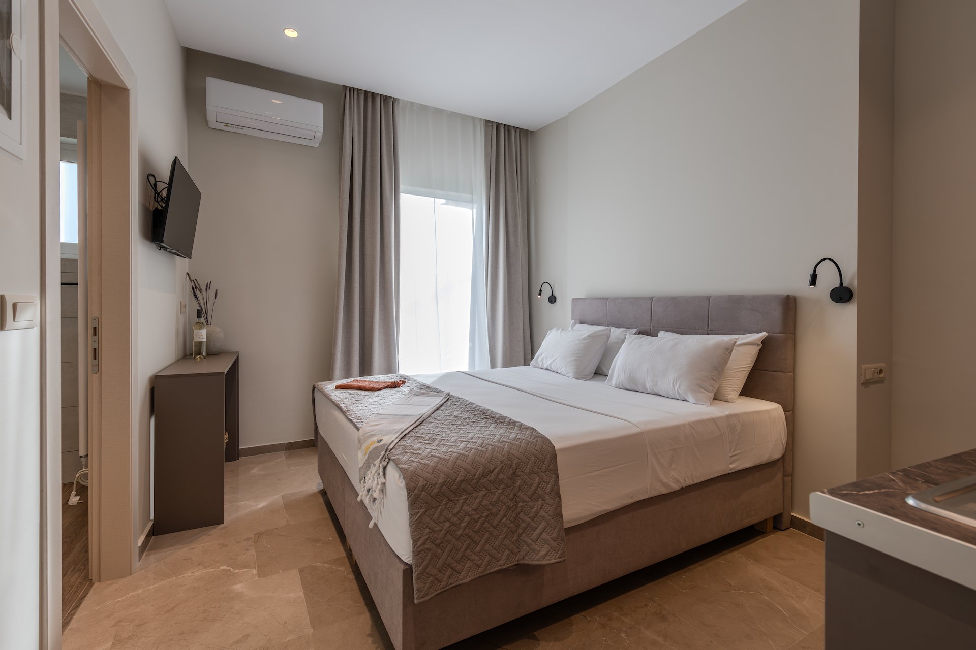 Superior Suite with Side Sea View - balcony at Noma Suites Tolo